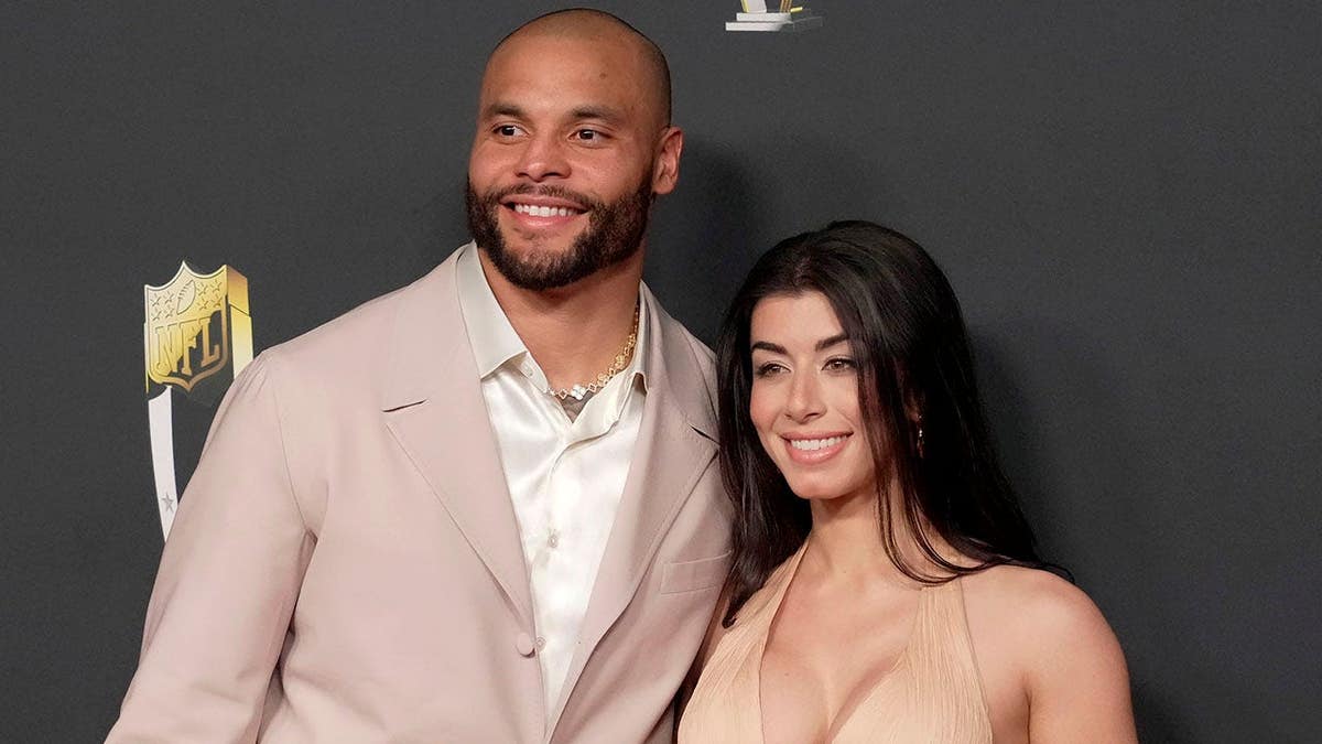 Dak Prescott and Sarah Jane Ramos standing together at NFL Honors event in San Francisco