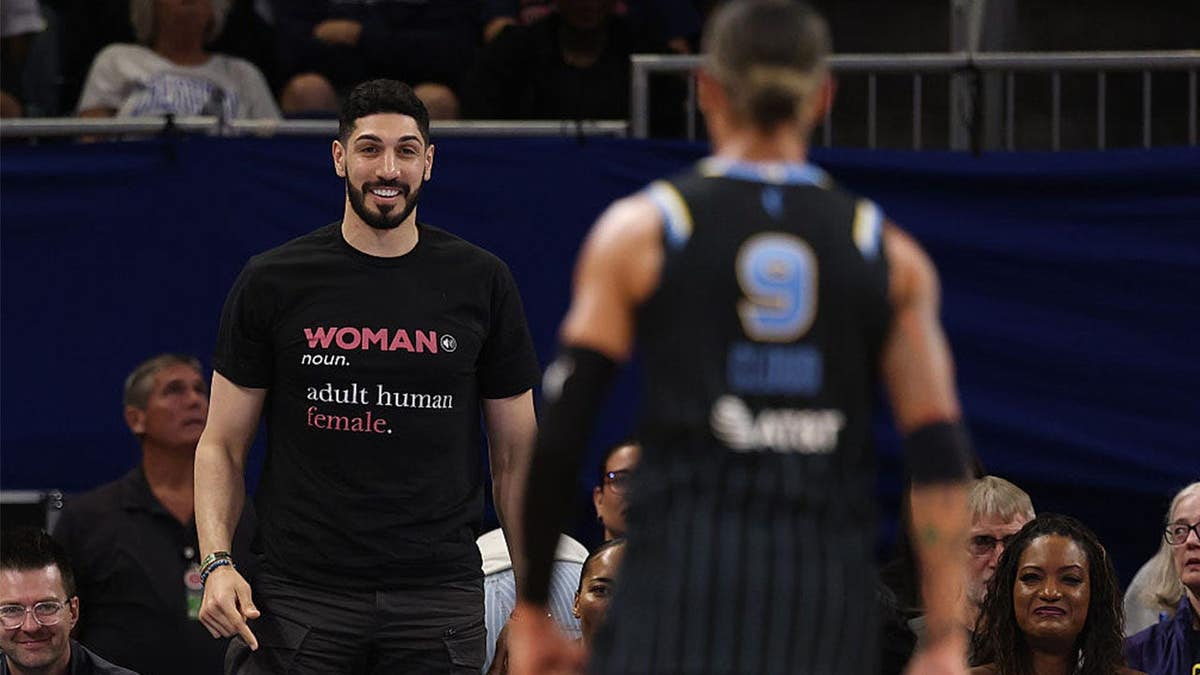Former basketball player Enes Kanter Freedom and Natasha Cloud #9 of the Chicago Sky