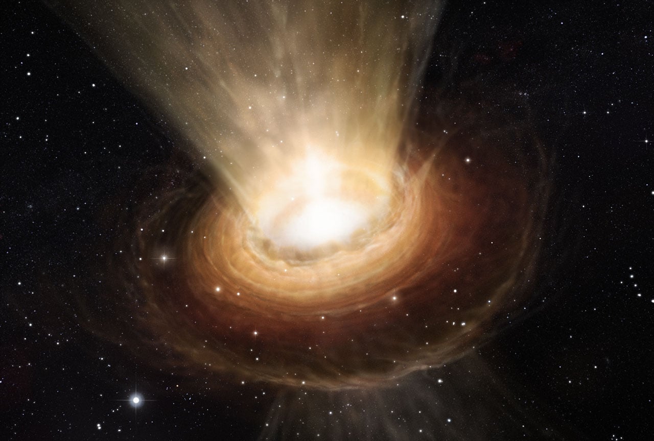 Artist's impression of the surroundings of a supermassive black hole. Credit - ESO / M. Kornmesser