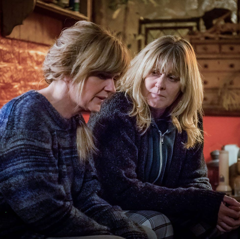 two women in a cozy room, having a serious conversation. two women in a cozy room, having a serious conversation.