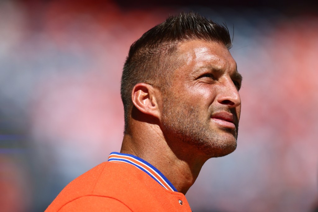 Former NFL quarterback Tim Tebow attends a game.