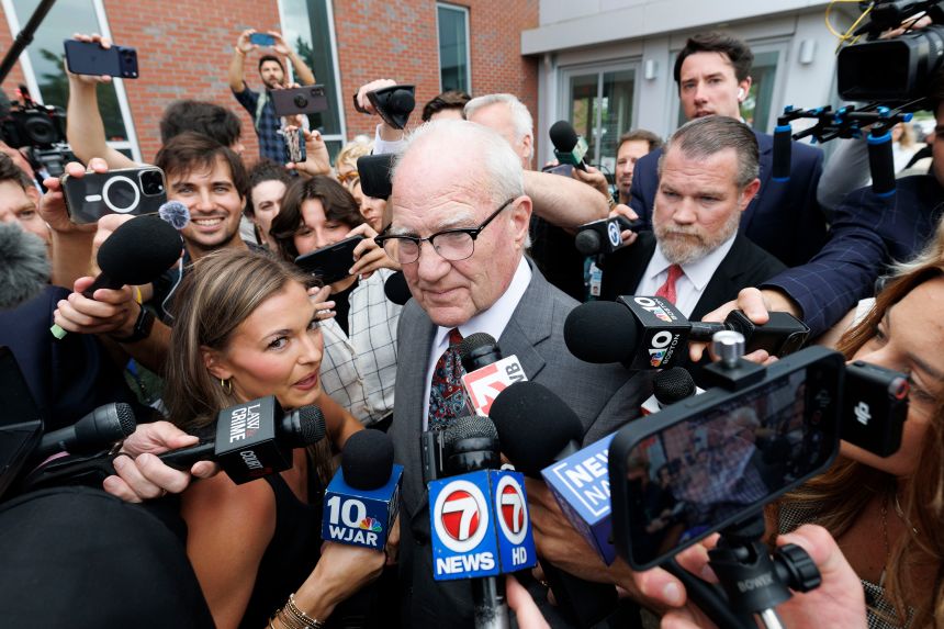 Kevin Reddington was swarmed by reporters as he left the courthouse Thursday.