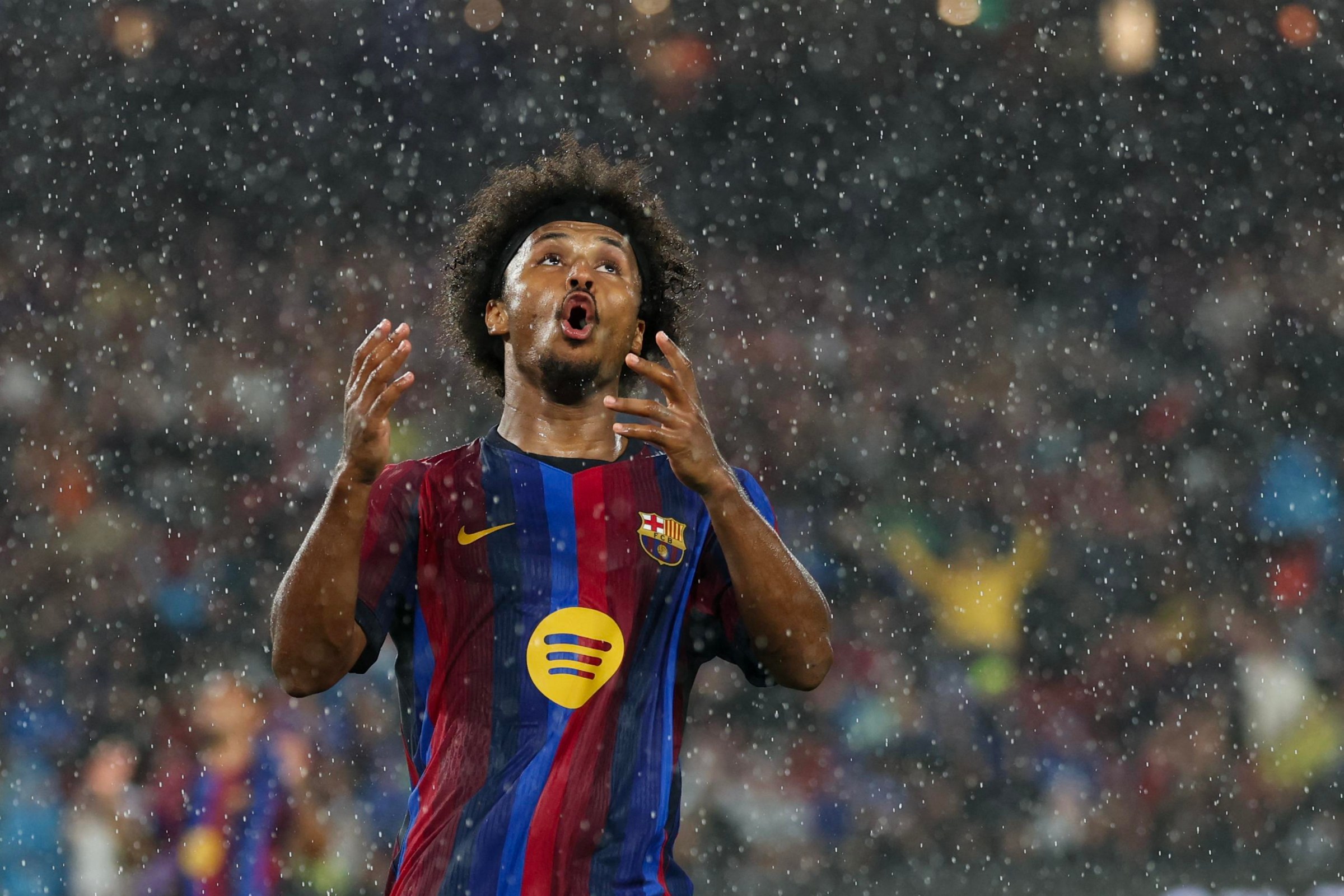 TOPSHOT - Barcelona’s German forward #14 Karim Adeyemi reacts after missing a chance to score during the Spanish league football match between FC Barcelona and Racing Santander at the Camp Nou stadium in Barcelona on September 16, 2026. (Photo by Lluis GENE / AFP via Getty Images)