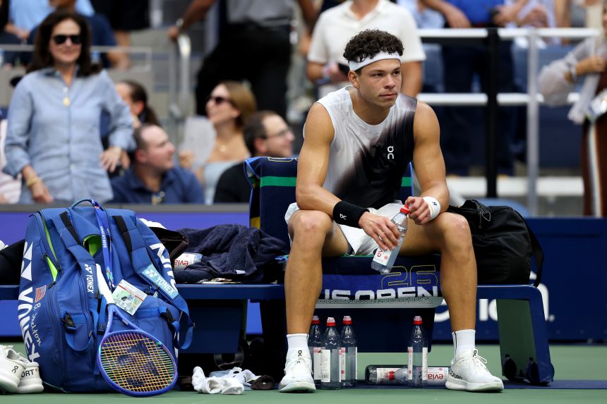Ben Shelton rests between games against Alexander Zverev in their Men's Singles Final match at the US Open.