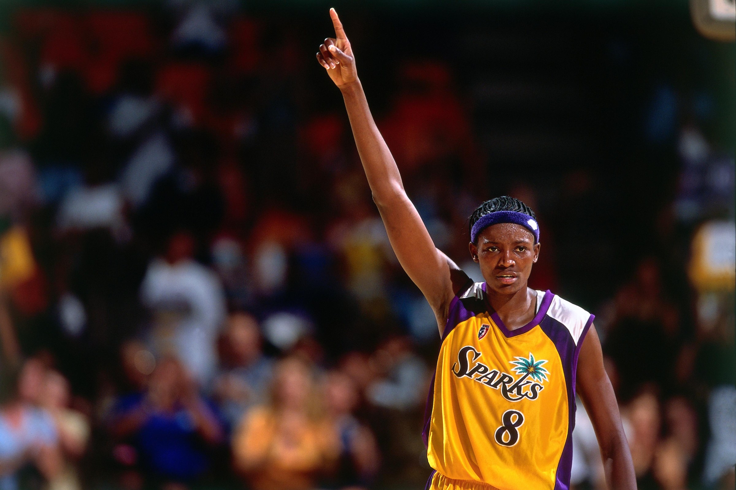 DeLIsha Milton-Jones celebrates a basket during the 2001 WNBA Finals.