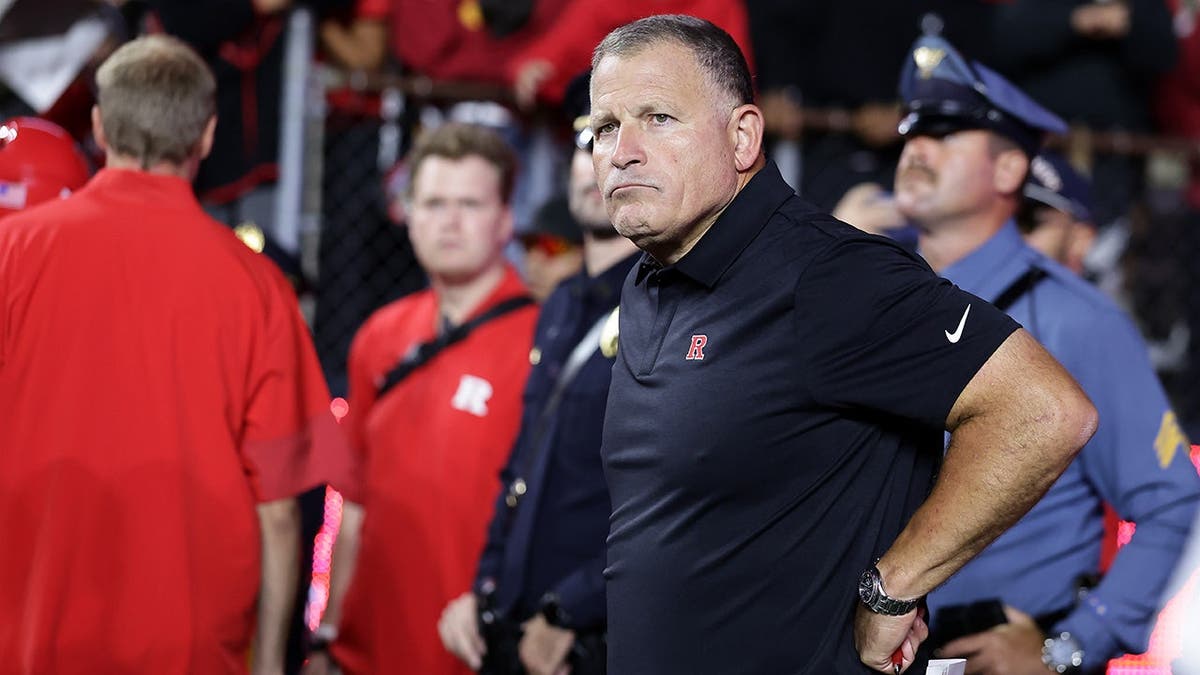 Greg Schiano reacts after a college football game in Piscataway, N.J.
