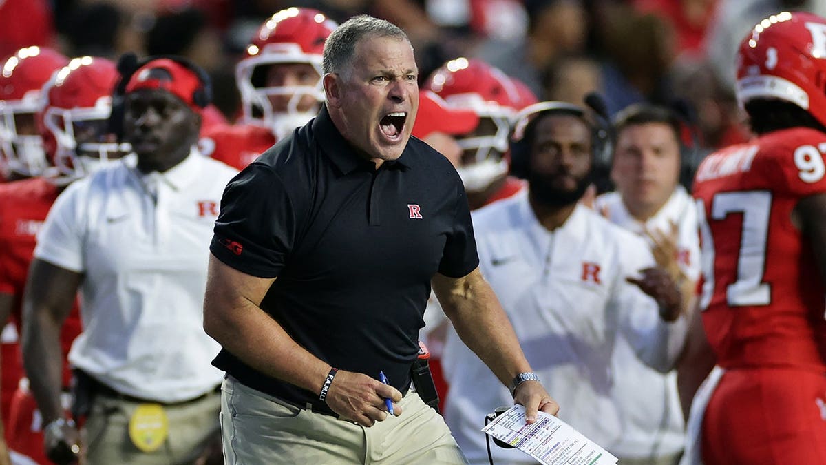 Greg Schiano reacts during the second half of a college football game.