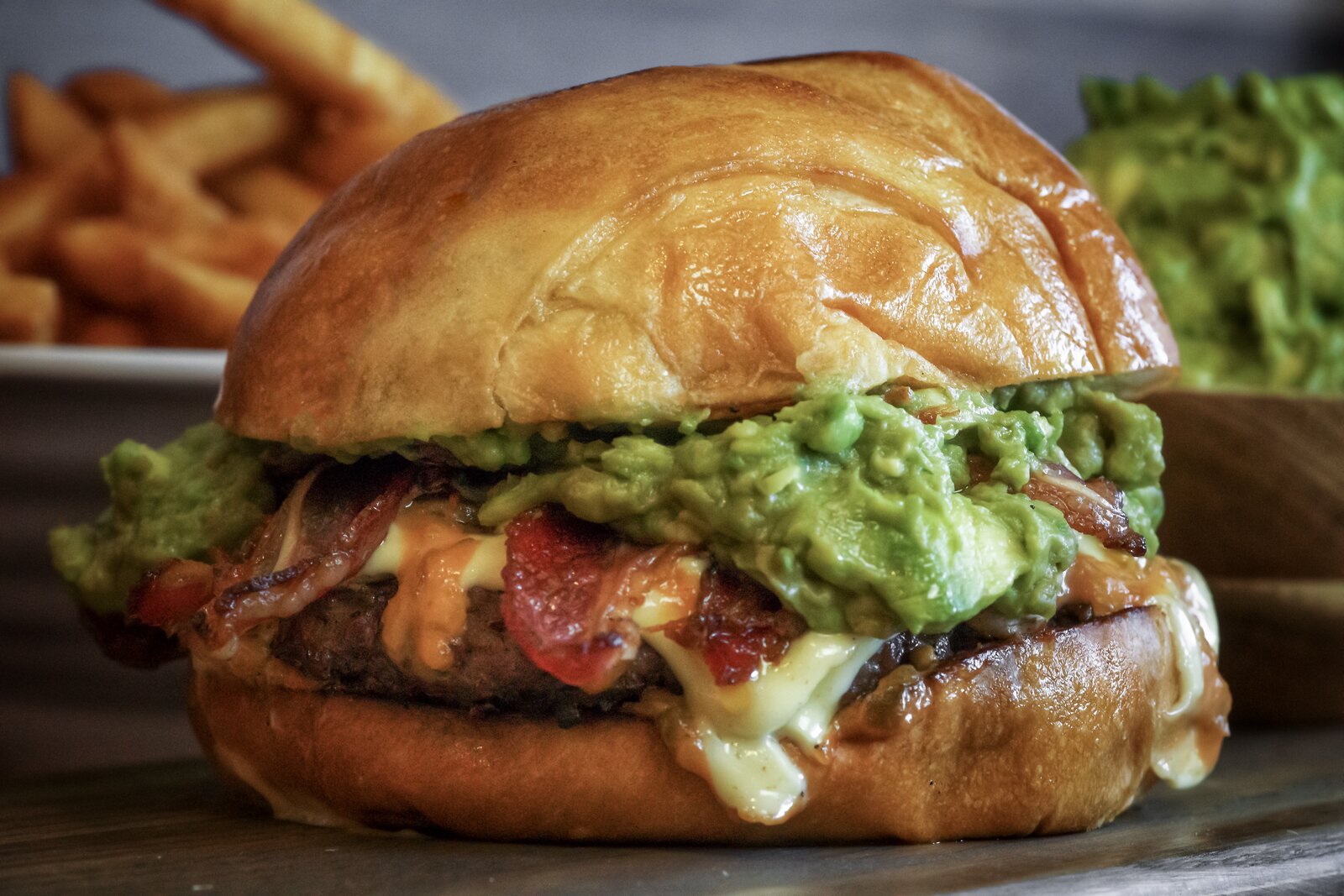 Holy Schnitzel bacon avocado burger