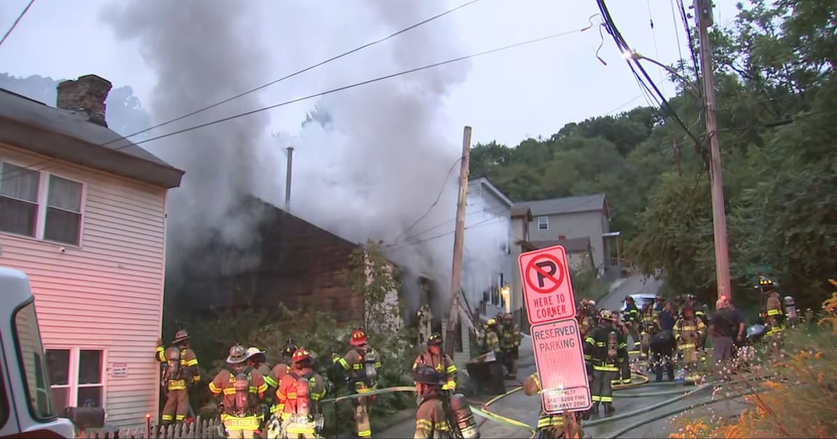 Crews battle smoky house fire in Millvale