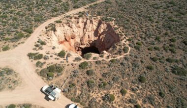 Caves beneath sinkhole reveal origin of mystery trenches that score Australian Plain