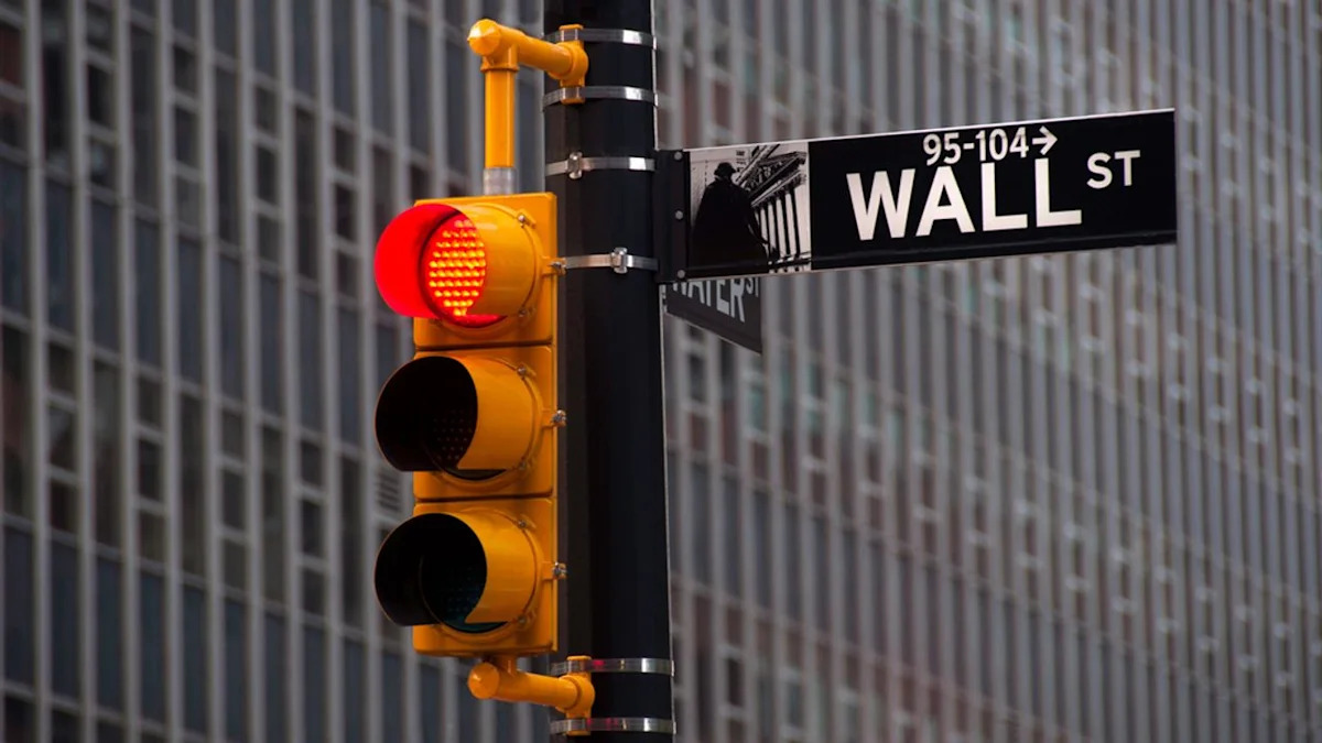 Wall Street closes lower as oil tops $95 and bond yields climb