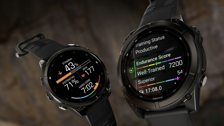 Two Garmin Fenix 9 smartwatches.