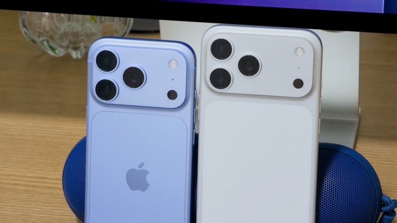 Blue iPhone 18 Pro next to a silver iPhone 17 Pro Max.