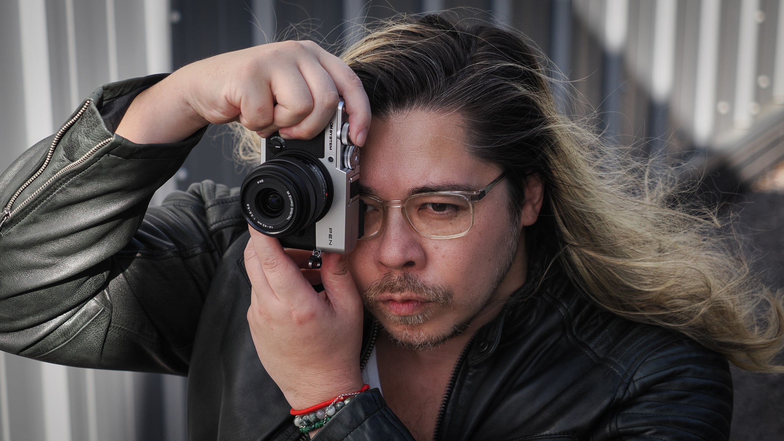 James Artaius shooting with the OM System PEN and the OM System M.Zuiko 14-42mm f/3.5-5.6 III in an urban setting