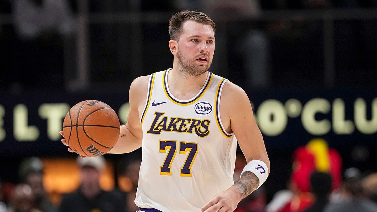Luka Doncic dribbles ball