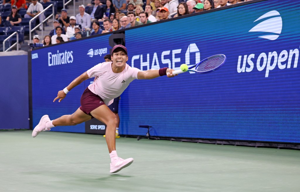 Learner Tien of the USA returns a volley against Karen Khachanov of Russia on Monday, September 7, 2026, at Louis Armstrong Stadium in Queens, New York.