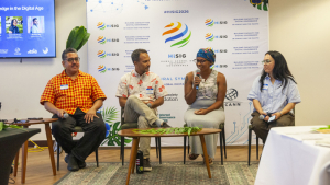 people sitting at the front of a room