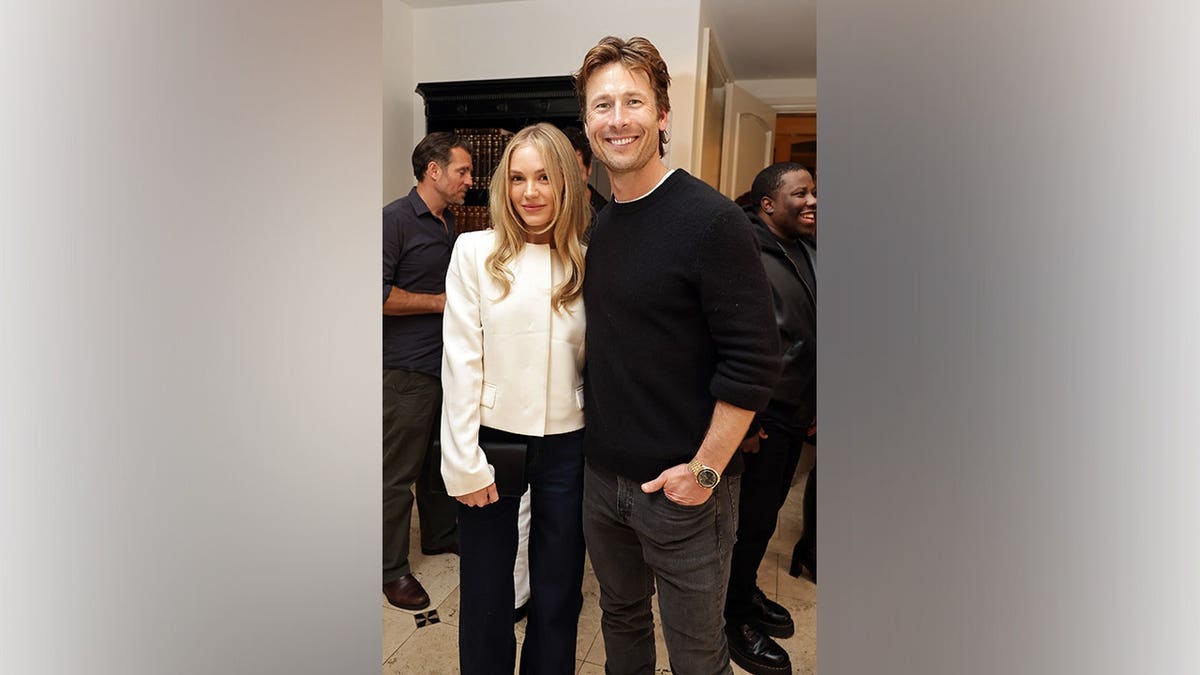 Michelle Randolph and Glen Powell attend the Apple Original Films 