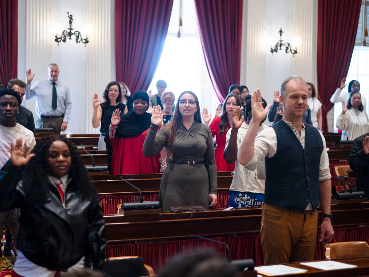 Somber and hopeful, 47 immigrants become U.S. citizens on 9/11 anniversary