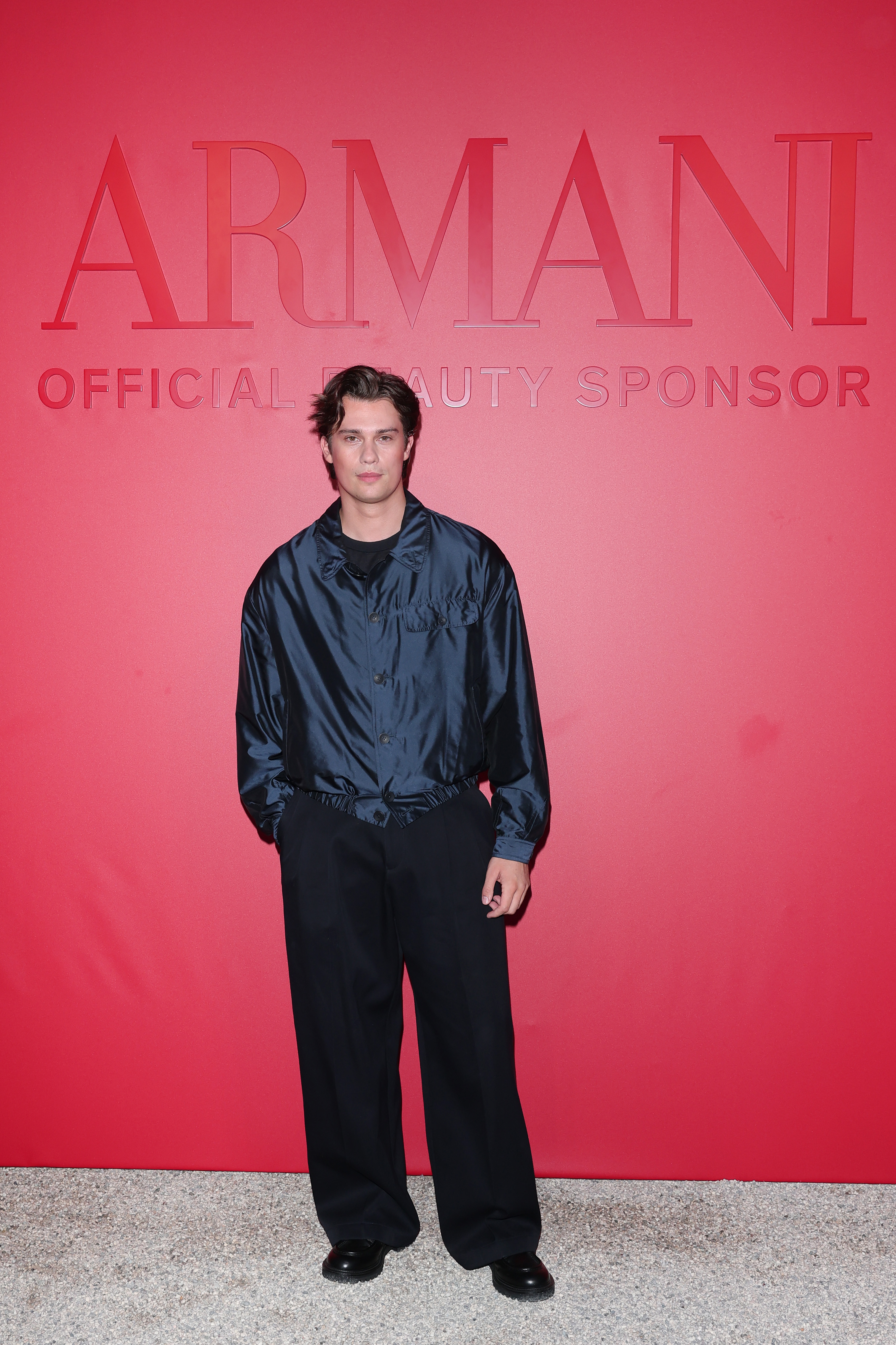 Nicholas Galitzine at the Armani Beauty exclusive dinner photocall during the 83rd Venice International Film Festival.