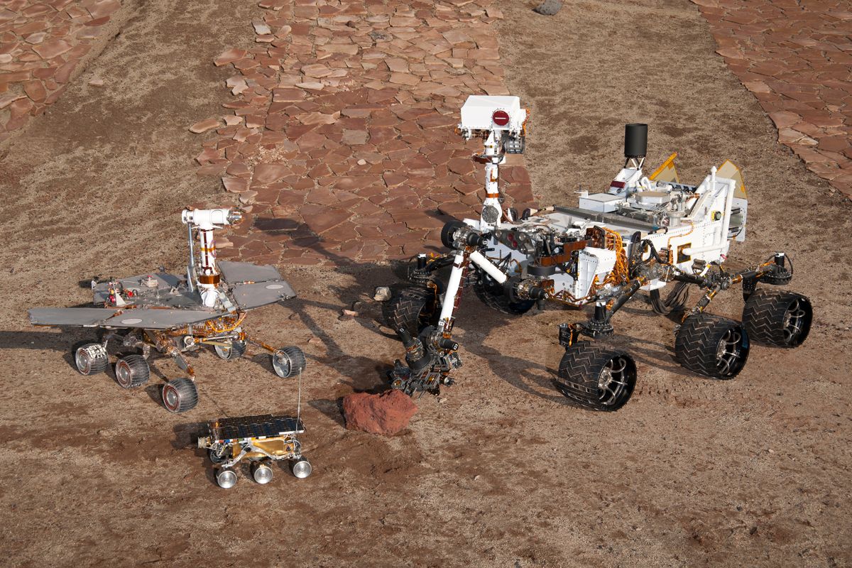 This grouping of two test rovers and a flight spare provides a graphic comparison of three generations of Mars rovers developed at NASA's Jet Propulsion Laboratory, Pasadena, Calif.