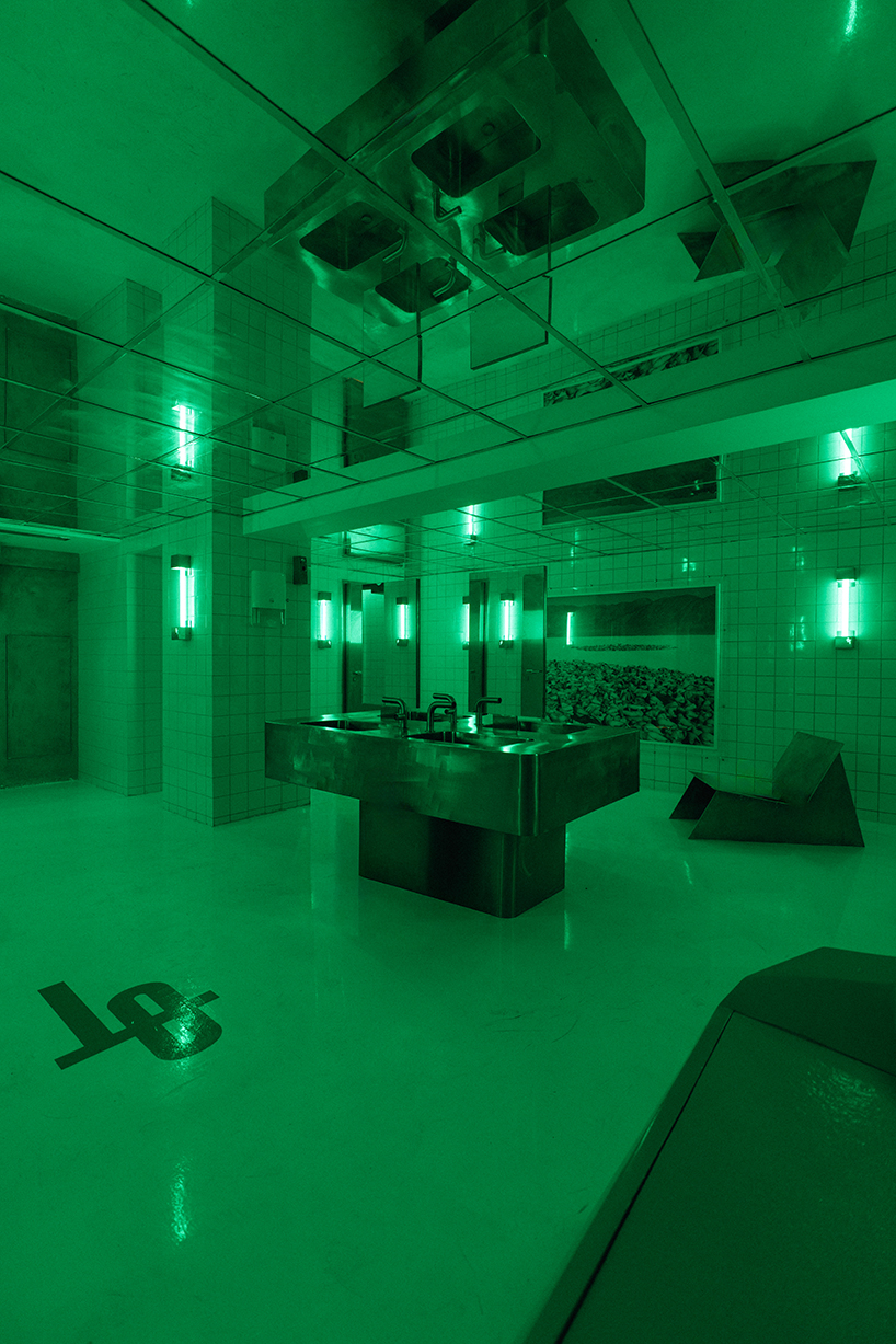 studiomateriality translates lucha libre into green-lit, stainless-steel bar in athens - 7