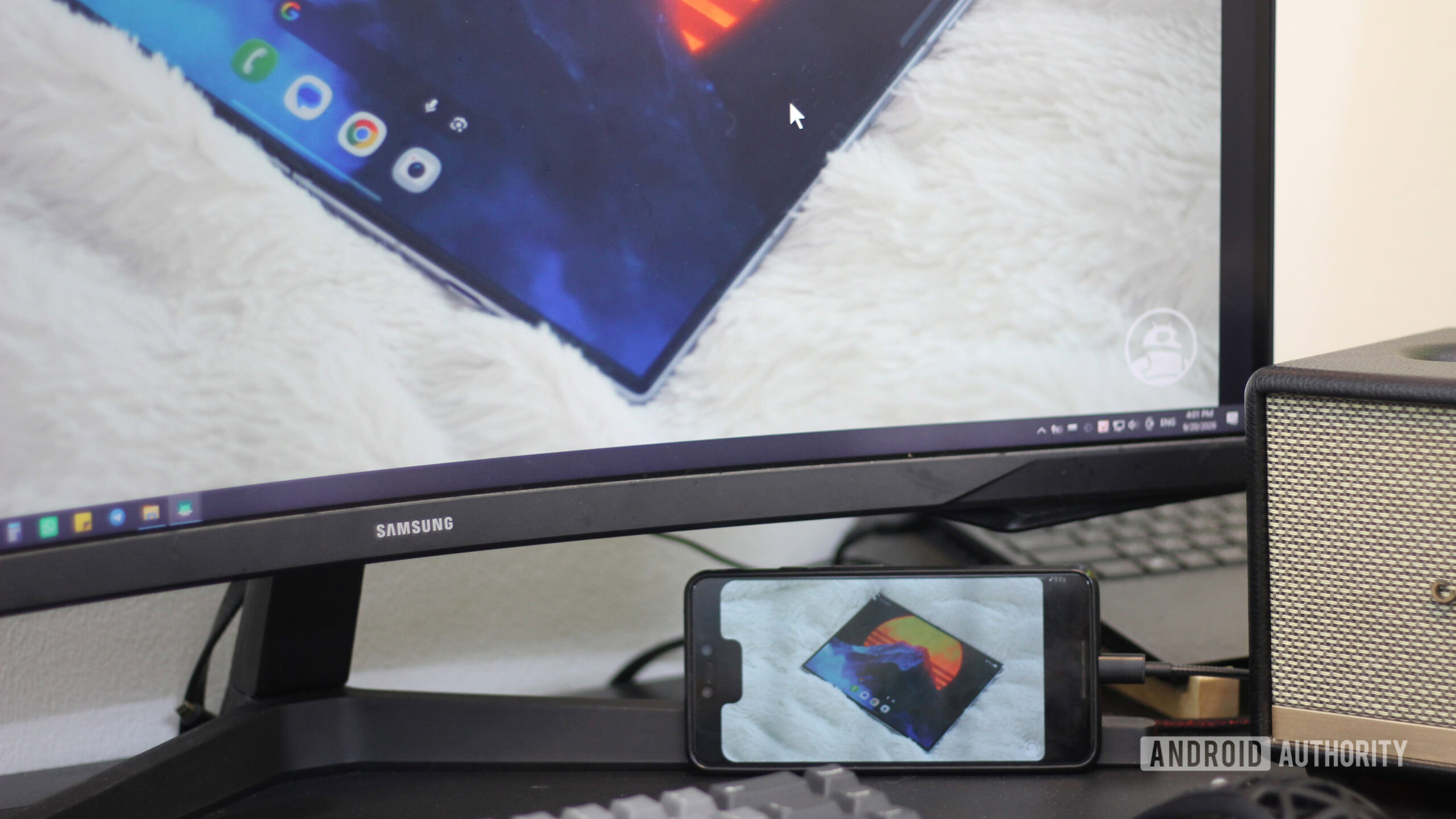 Pixel 3 XL connected to a monitor and being used as a media hub.
