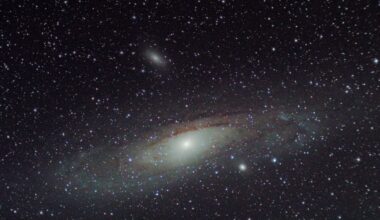Andromeda is visible from 2.5 million light-years because the light of hundreds of billions of stars blends together. But an Earth-like planet there would be roughly ten billion times fainter than its own star and separated from it by only about 1.3 microarcseconds—far beyond the direct-imaging ability of any existing telescope.