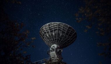 Astronomers used 69 fast radio bursts as cosmic backlights to complete the clearest census yet of the universe’s missing ordinary matter, finding that roughly 76% resides as extremely diffuse ionized gas in the vast spaces between galaxies — while only 9% remains inside galaxies as stars and gas.
