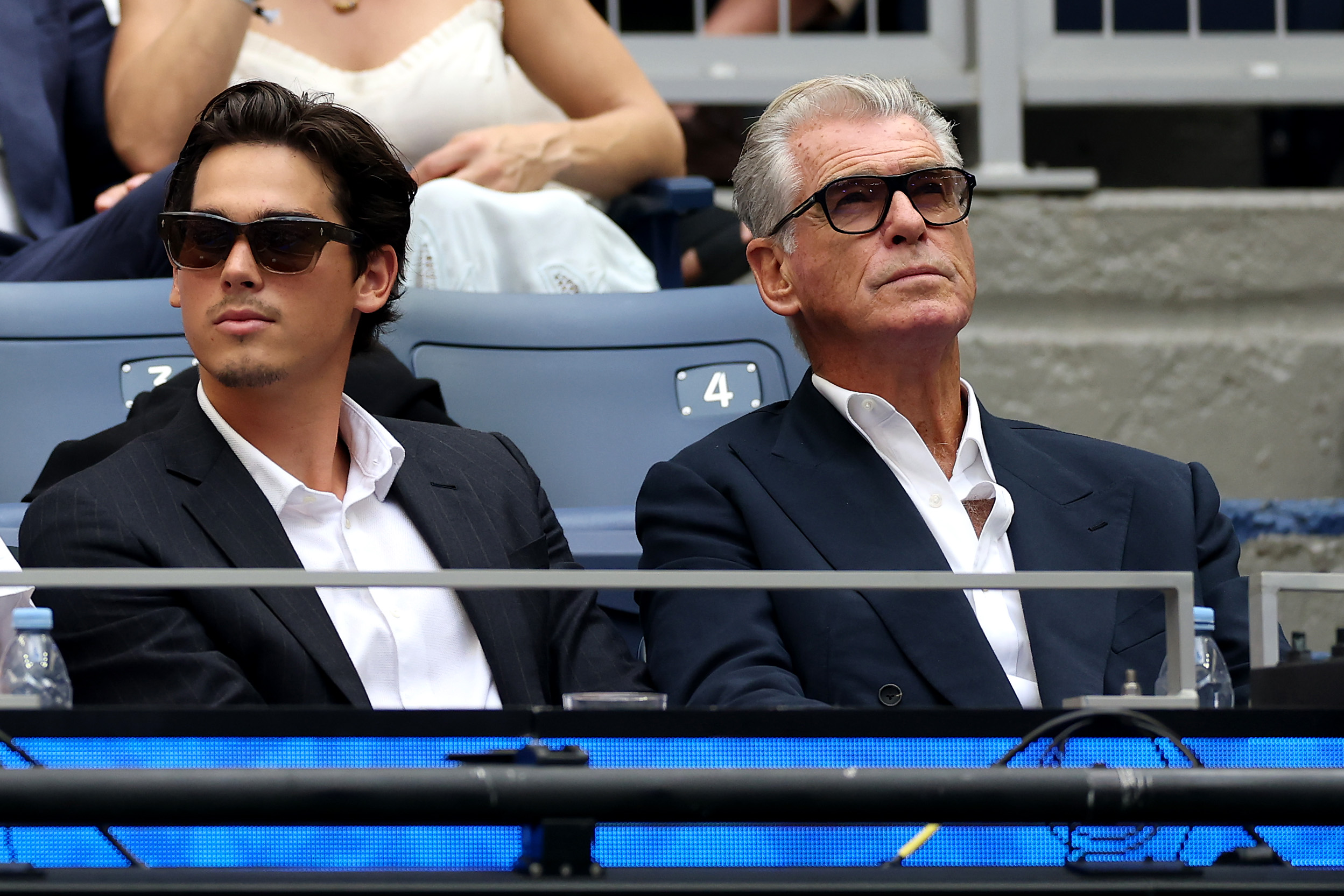 Pierce Brosnan and his son Paris Brosnan at the 2026 US Open Men's Singles Final.
