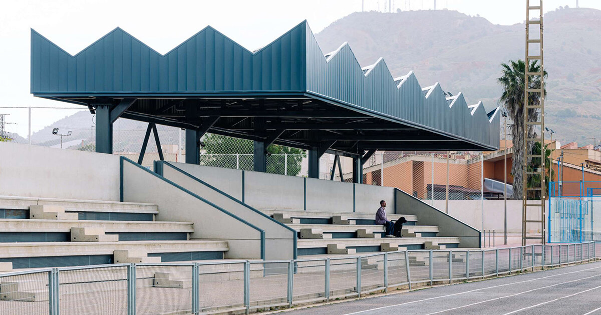 lime-green gateway and blue solar canopy reform sports center in spain
