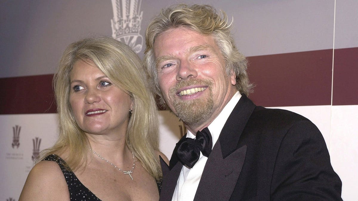Sir Richard Branson and Joan at a celebrity charity fashion show.