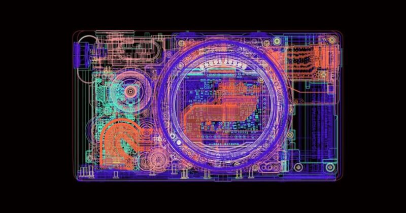 A neon-colored, wireframe-style X-ray view of a digital camera showing internal circuitry, lens components, and mechanical parts against a black background.