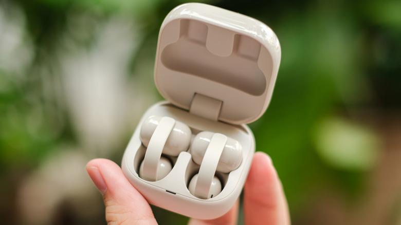 The Sony LinkBuds Clip earbuds in their case.