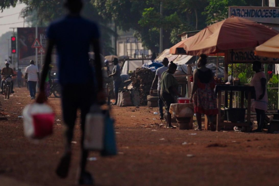 People walk down the streets of Bangui, the capital of the Central African Republic.