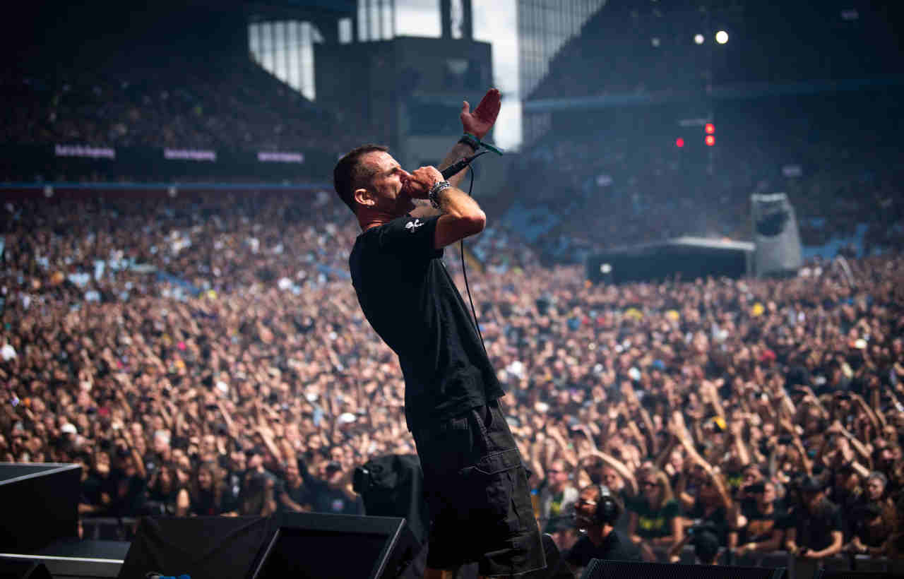 Lamb Of God&rsquo;s Randy Blythe performing onstage at the Back To The Beginning show at Villa Park in July 2025