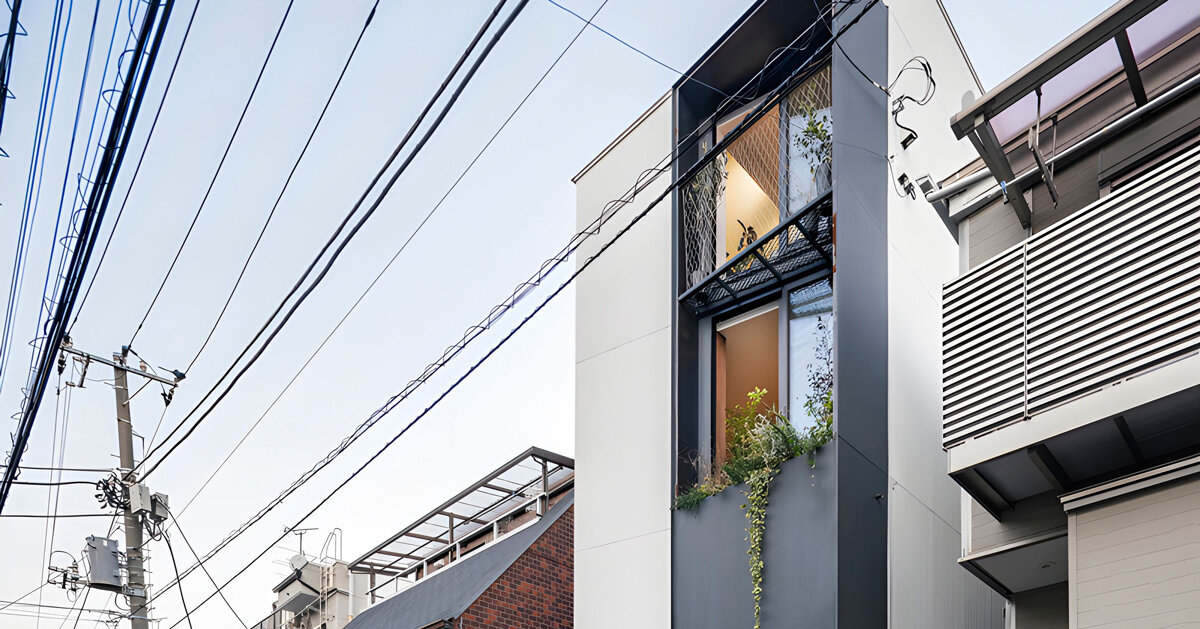 voids and vertical space reinterpret traditional japanese machiya on a compact site in tokyo