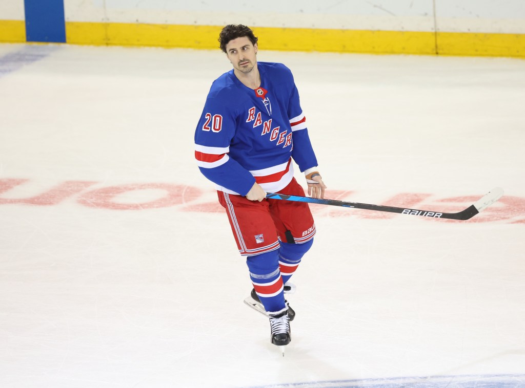 New York Rangers left wing Chris Kreider in his blue and red jersey on the ice.