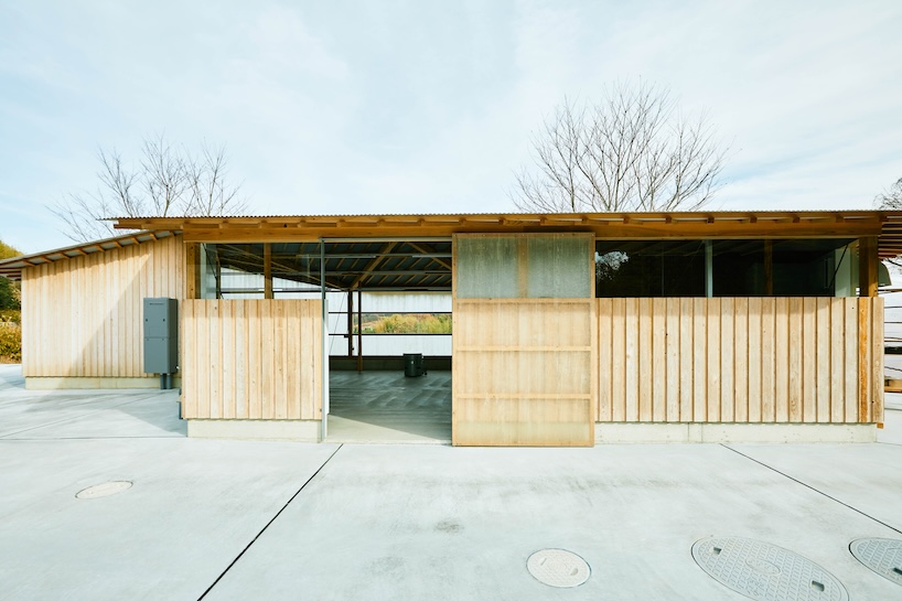triangular timber structure encloses tsukumo kiln ceramic studio in kobe, japan - 3