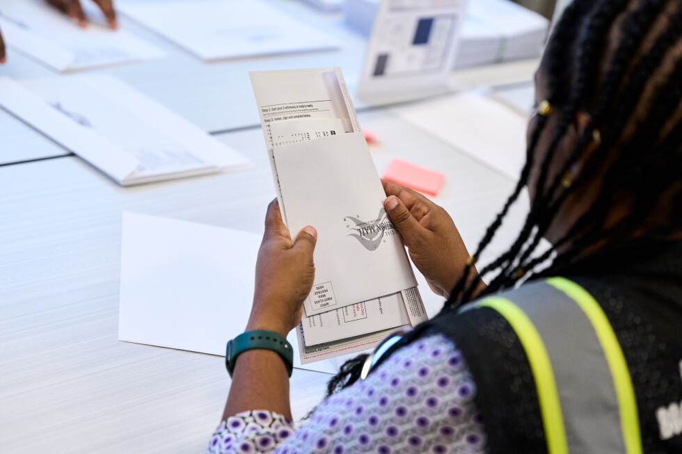 Mail ballots start to go to voters as Trump injects uncertainty
