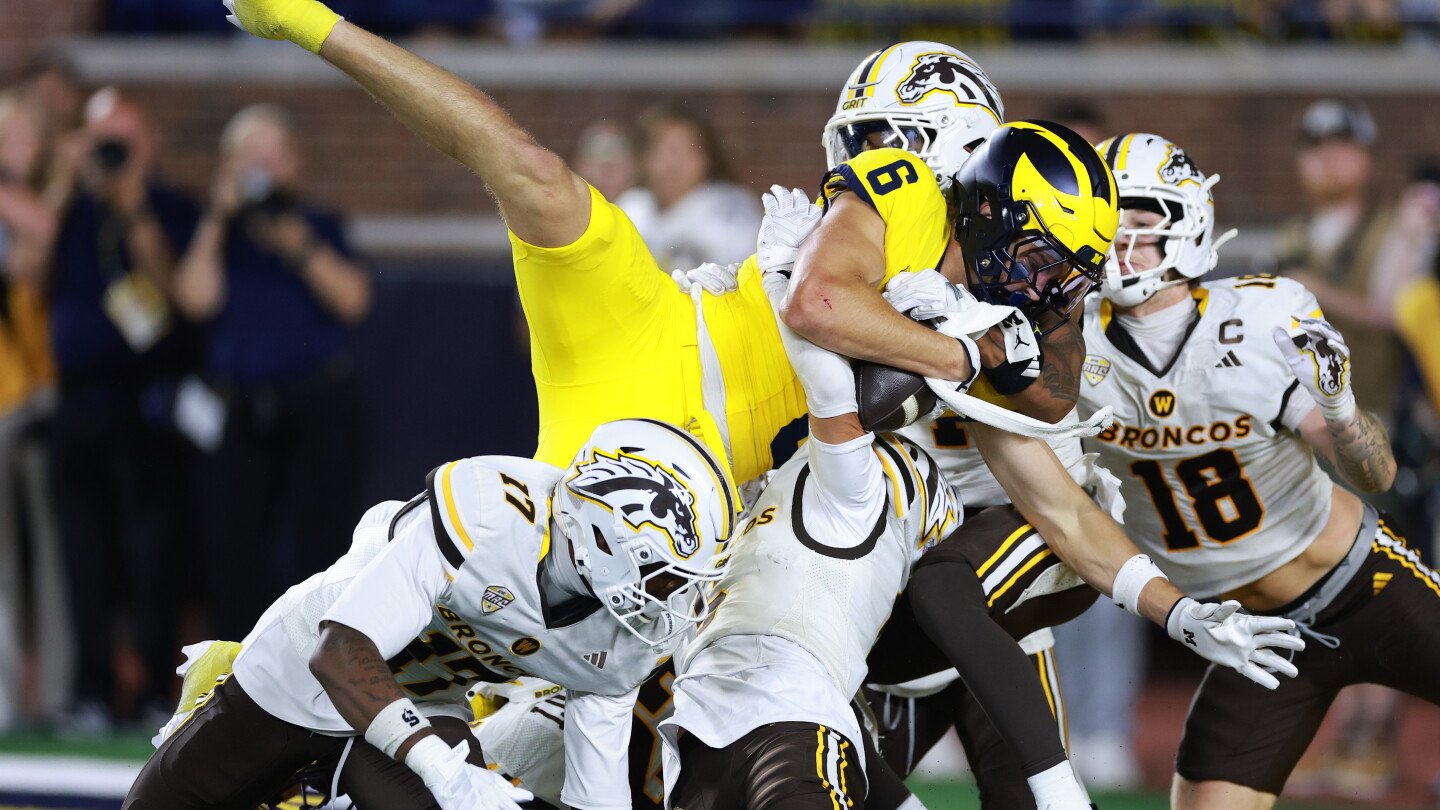 Michigan avoids disaster via all-time controversial call