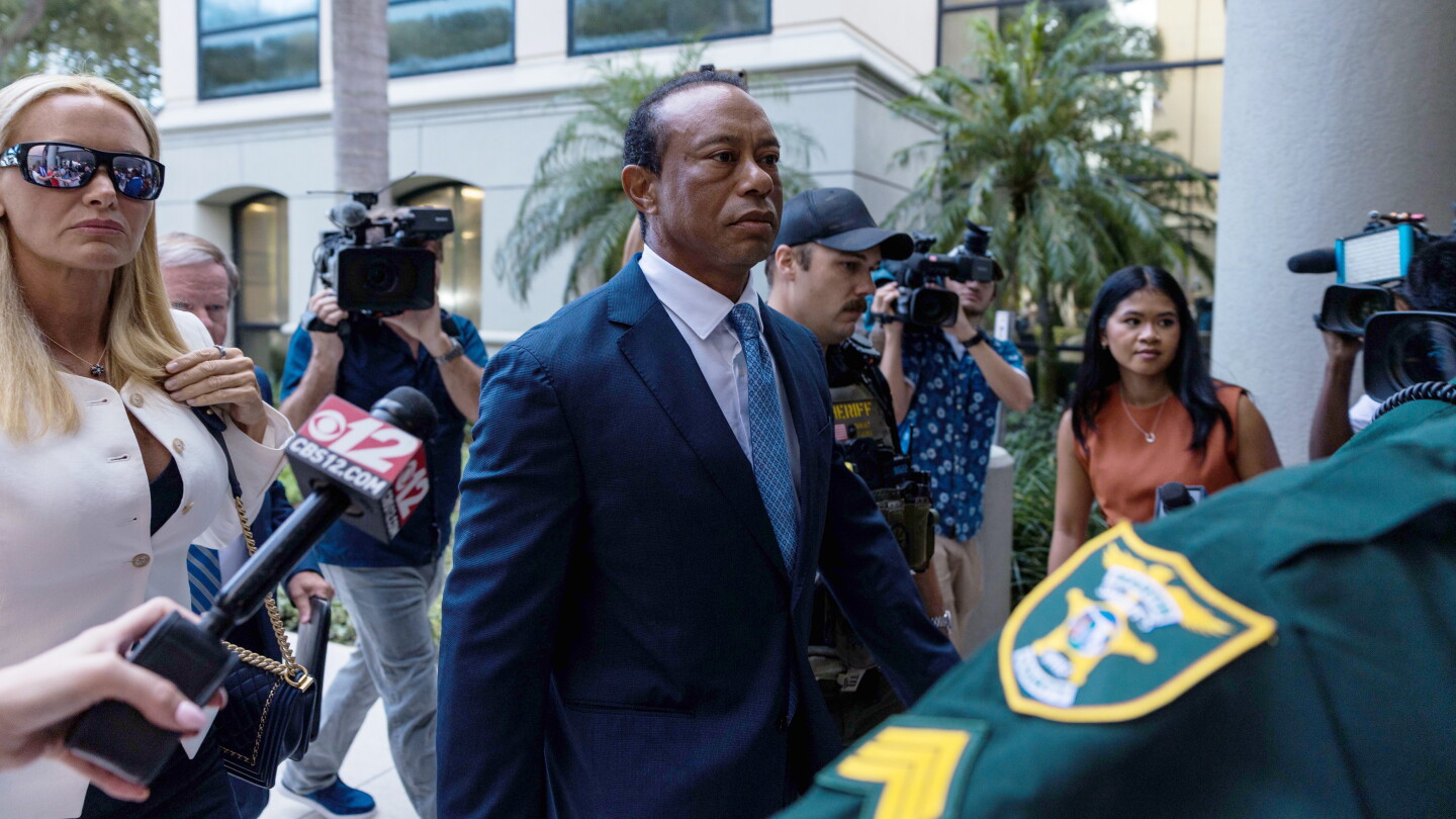 Tiger Woods pleads no contest in March crash, driver's license suspended for five years