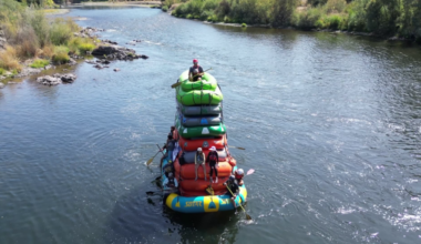 Local rafters navigate Rogue River on record-breaking ten-raft stack