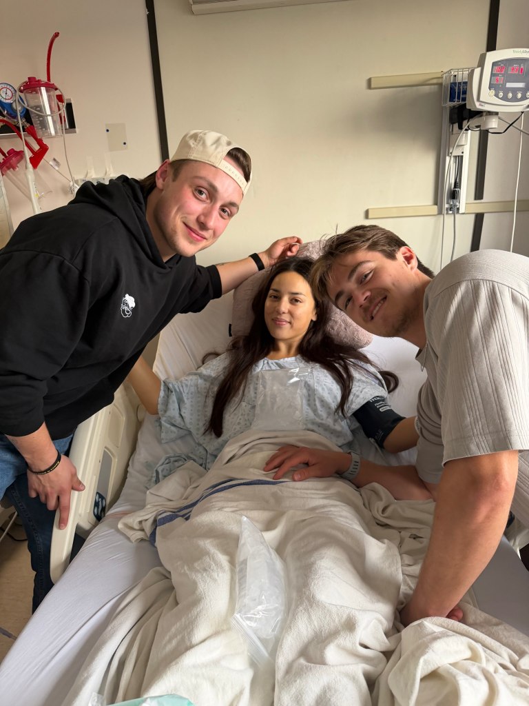 NHL prospect Austin Roest and figure skater Milaria Okabe in her hospital bed with another man.