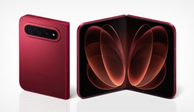 A red Xiaomi foldable smartphone shown from the back and in an open, unfolded position against a white background.