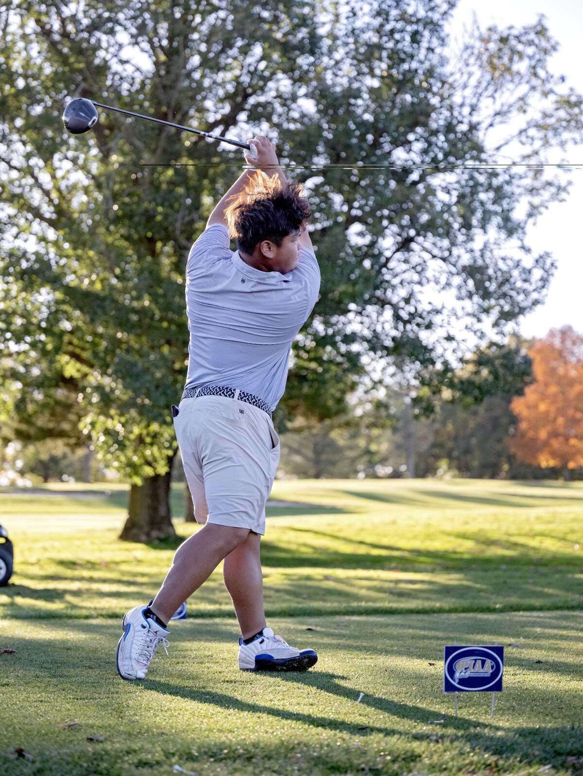 State College’s Jacky Sun tees off on the first hole of the playoff for the PIAA Golf Team Championships on Wednesday, Oct. 21, 2026 at the Penn State Golf Course.