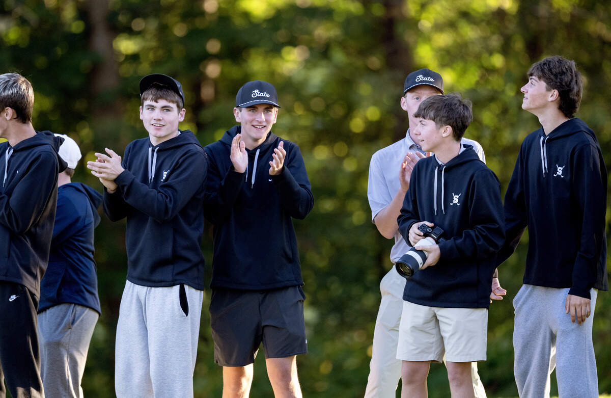 State College golf team cheers on their teammates during the playoff for the PIAA Golf Team Championships on Wednesday, Oct. 21, 2026 at the Penn State Golf Course.