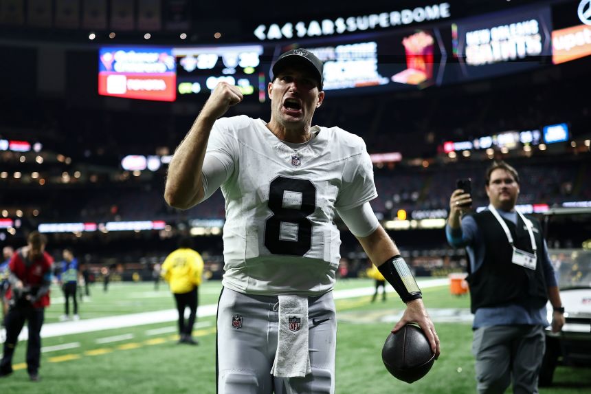 Las Vegas Raiders QB Kirk Cousins celebrates after defeating the New Orleans Saints 35-27 at Caesars Superdome on September 27 in New Orleans.