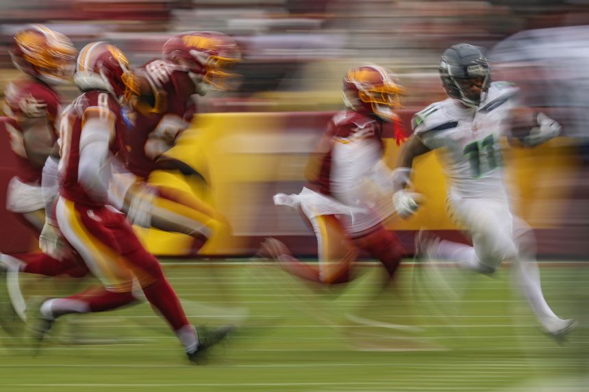 Seattle Seahawks wide receiver Jaxon Smith-Njigba runs against the Washington Commanders at Northwest Stadium in Landover, Maryland, on September 27.