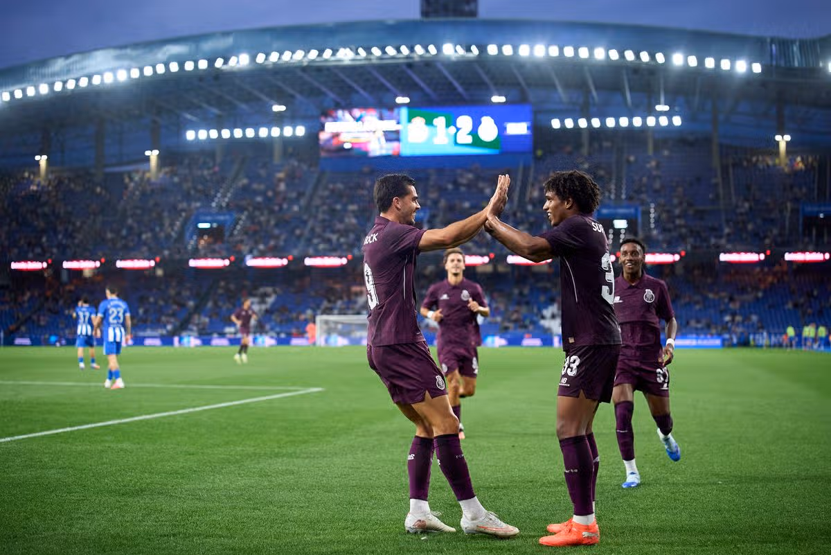Tottenham youngster Souza celebrates with Andre Silva during the friendly match between RC Deportivo A Coruna and FC Porto at Abanca Riazor Stadium